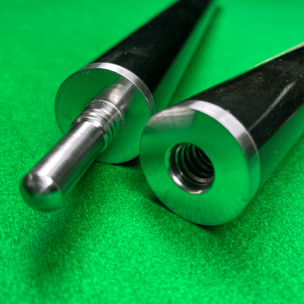 Unscrewed Professional Snooker Cue on green table cloth