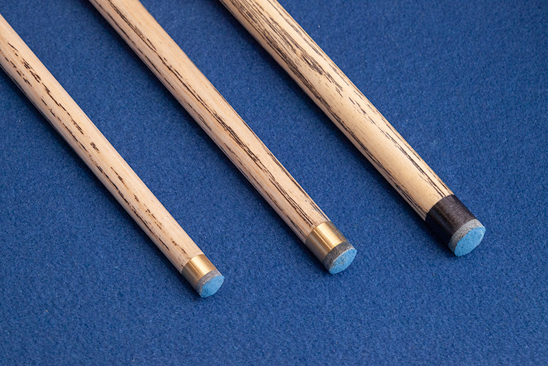 Britannia Grand tips at 9 to 9.5mm on a blue background, standard on all Champion snooker cues